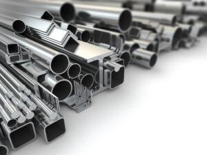 assortment of structural steel beams, pipe and bars