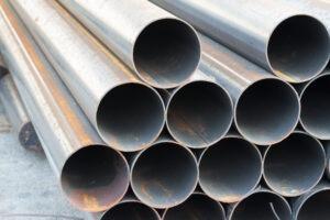 carbon steel pipes stacked on top of each other
