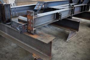 close up of steel beams stacked on top of each other