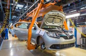 Grey car manufactured in an automotive factory